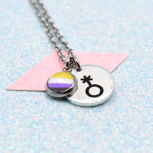Non Binary Necklace with a Non Binary Pride charm on a light blue and pink background