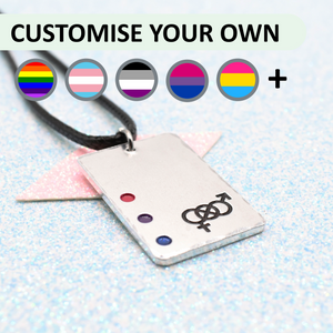 Custom Pride Necklace with a rectangular tag featuring a Choice of pride flags and symbols and accents on a light blue background