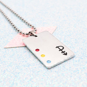 Pansexual Necklace with a rectangular tag featuring a Pansexual symbol and accents on a ball chain displayed on a light blue background