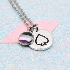 Necklace with an asexual pendant featuring a asexual pride flag on a light blue and pink gradient background.