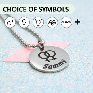 Pride Necklace with a round pendant featuring twin Venus symbols and the name 'Sammy' on a light blue background.