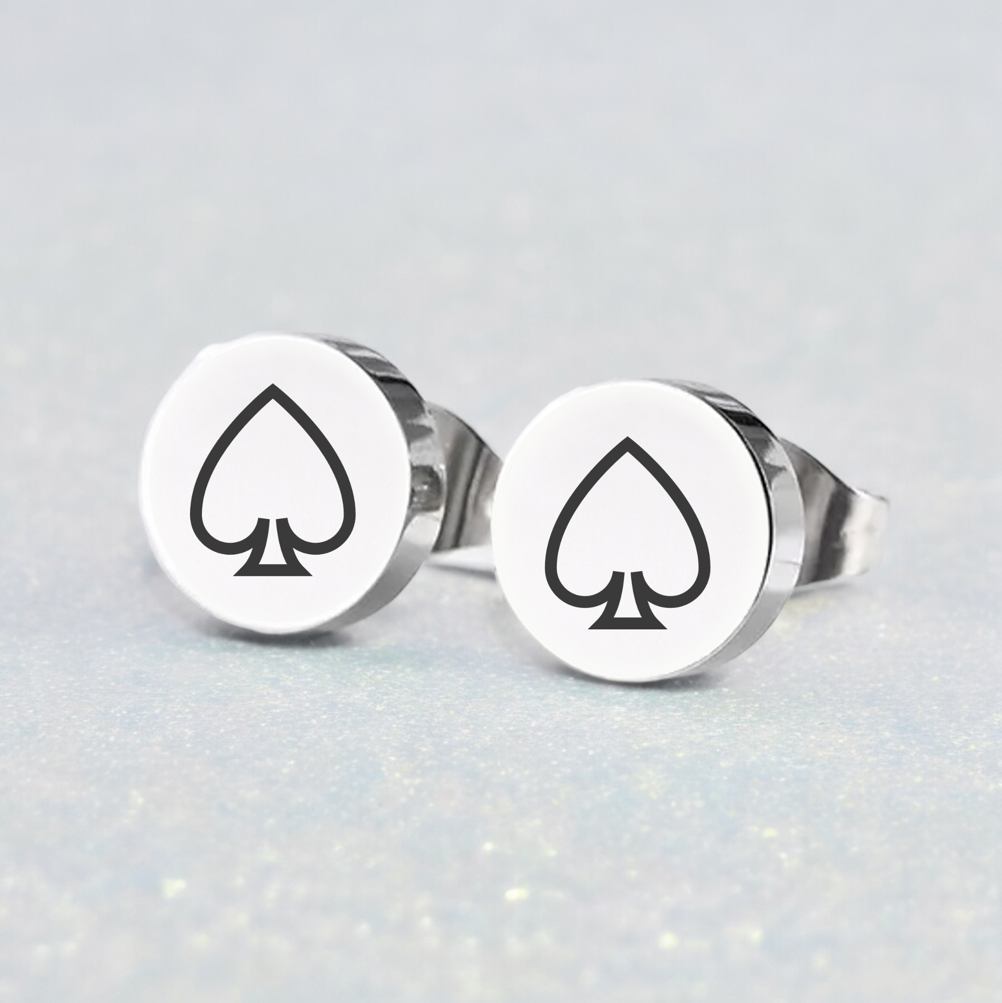 A pair of asexual stud earrings with a mirror finish, featuring an asexual design on a silver background.