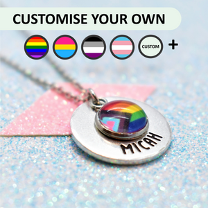 Personalised pride necklace with rainbow design and customizable options on a glittery background