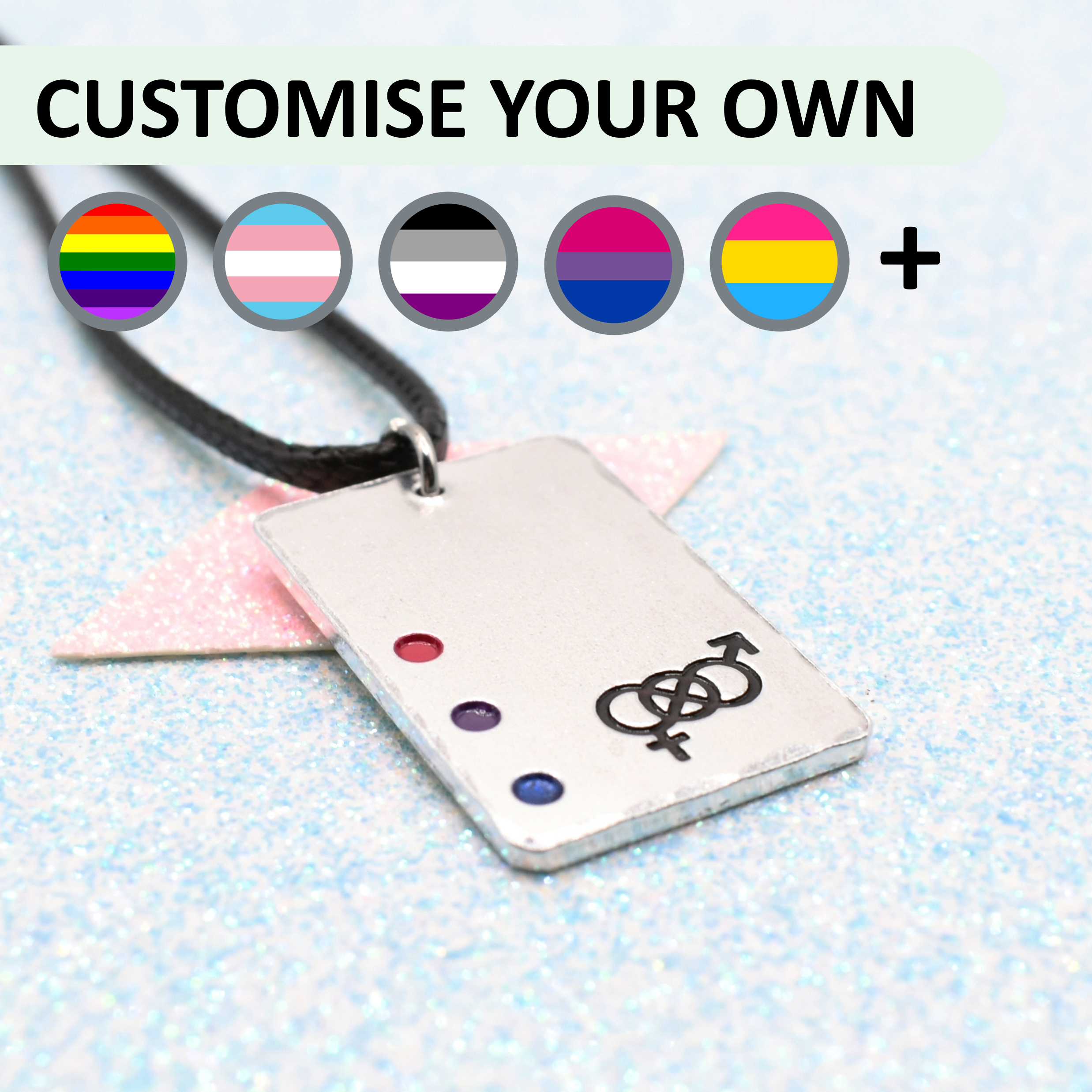 Custom Pride Necklace with a rectangular tag featuring a Choice of pride flags and symbols and accents on a light blue background